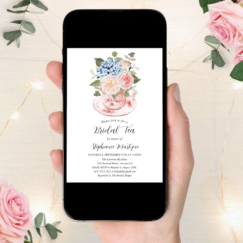 blue_hydrangea_pink_floral_bridal_tea_shower_digital_invitation Digital bridal tea shower invitation with watercolor teacup design with blue hydrangea and pink flowers with butterfly and script typography.